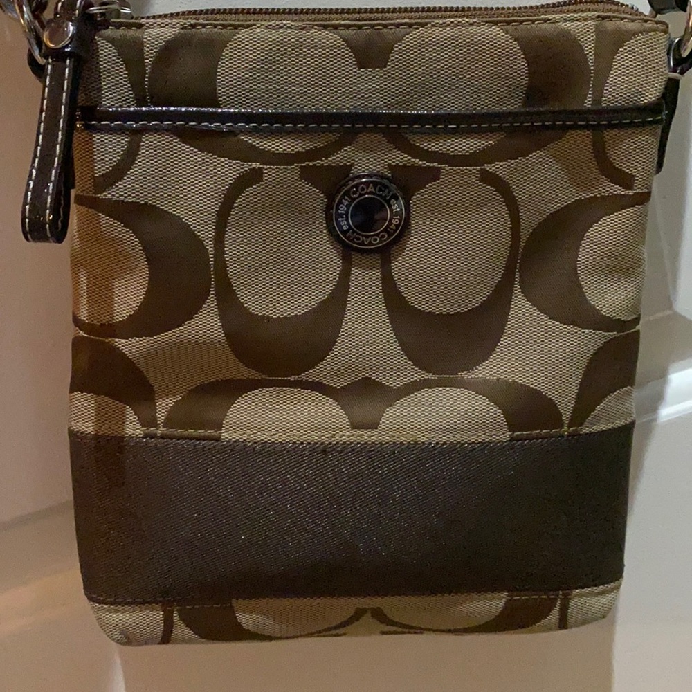 Coach crossbody purse.